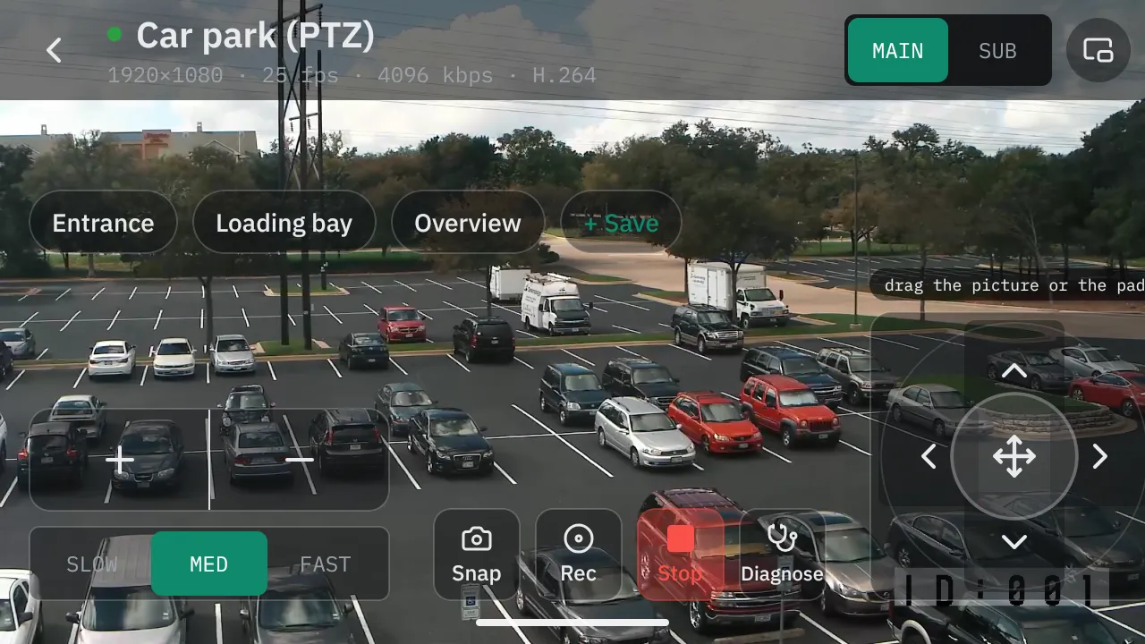 Live view on an Android phone held sideways: the picture fills the screen with the saved positions, speed, zoom and pan-tilt pad drawn over it.