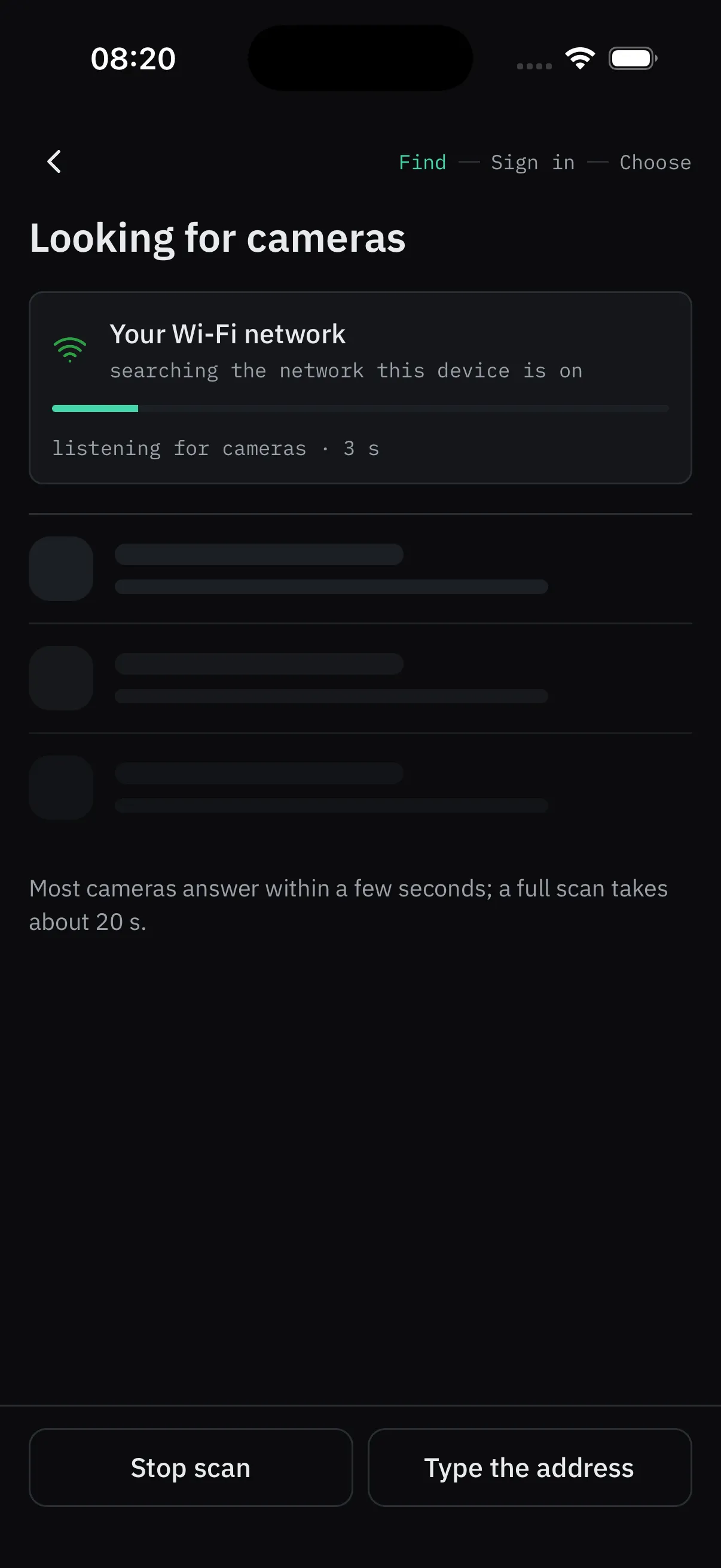 The scan screen while it looks for cameras, with a progress bar and a plain-language status line.
