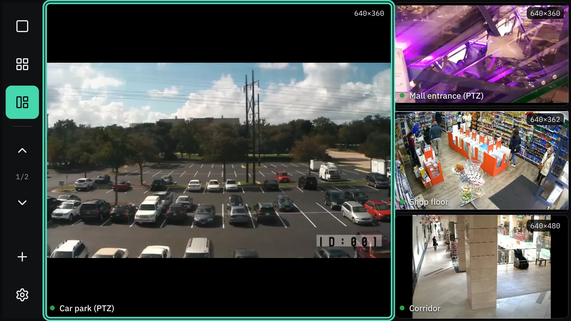 The Android TV wall in the 1+3 layout: the car park large with a mint focus ring, three cameras stacked on the right.